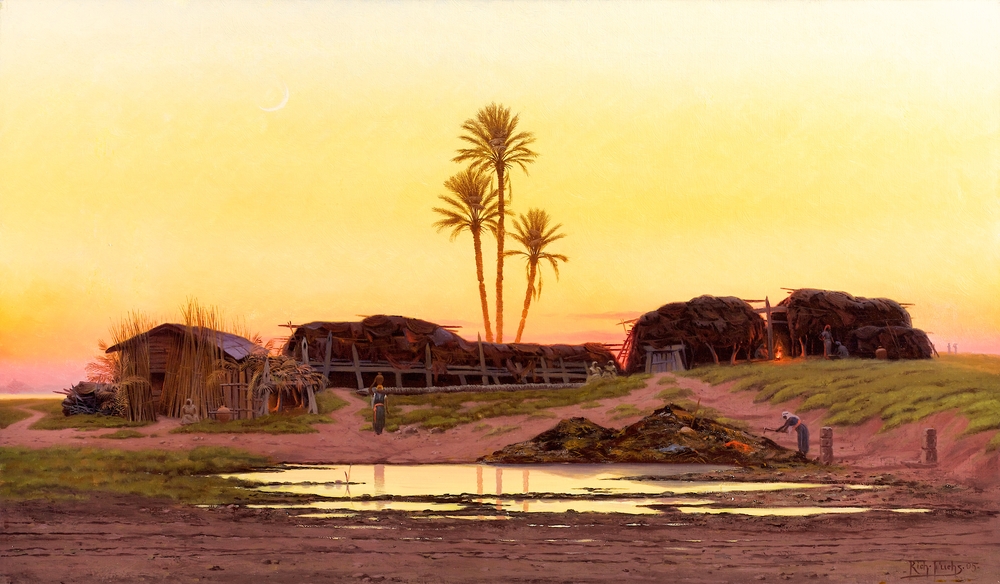 Village africain avec porteur d'eau devant un point d'eau et coucher de soleil