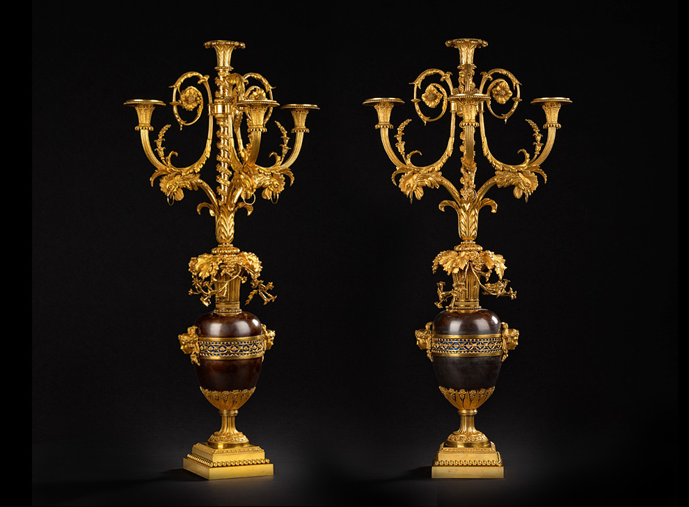 A large pair of four-light girandoles