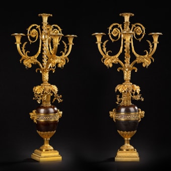 A large pair of four-light girandoles