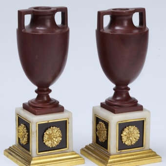 A Pair of Neoclassical "rosso antico" Vases