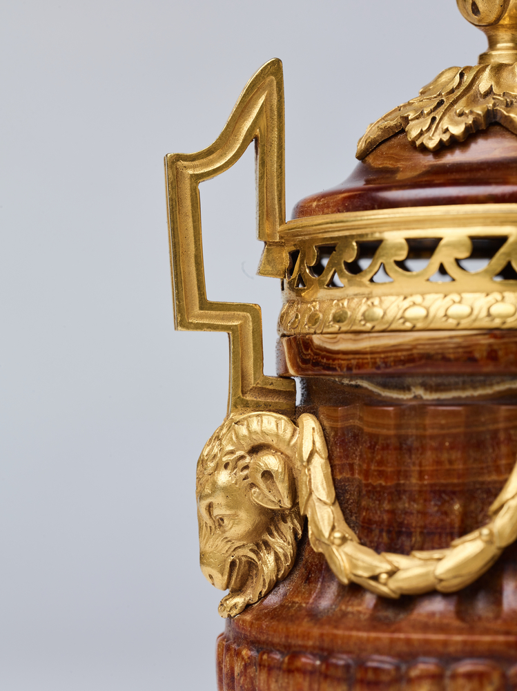 A Pair of Gilded Vases 
of Oriental Onyx