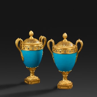 A Pair of Sèvres Bleu Celeste Porcelain Covered Vases with Bronze Decoration