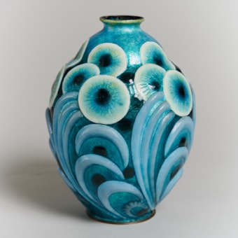 Enameled Copper vase in shades turquois