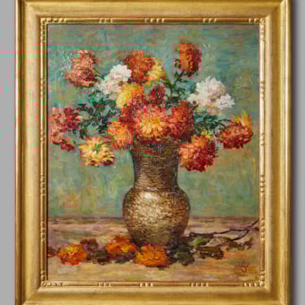 Dahlias in a baluster vase against a turquoise-green background
