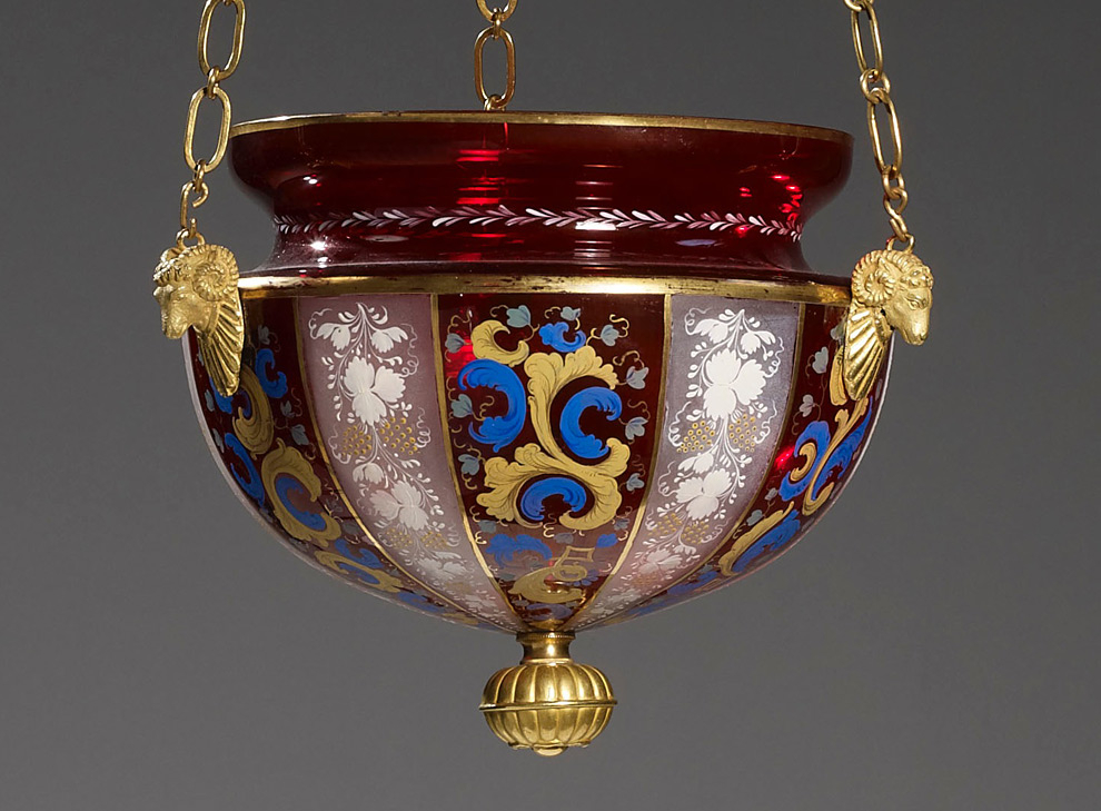 A polychrome painted glass lantern