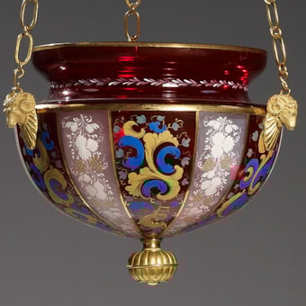 A polychrome painted glass lantern